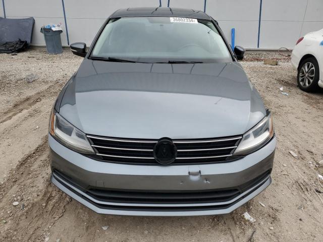 3VWDB7AJ1HM243401 - 2017 VOLKSWAGEN JETTA SE GRAY photo 5