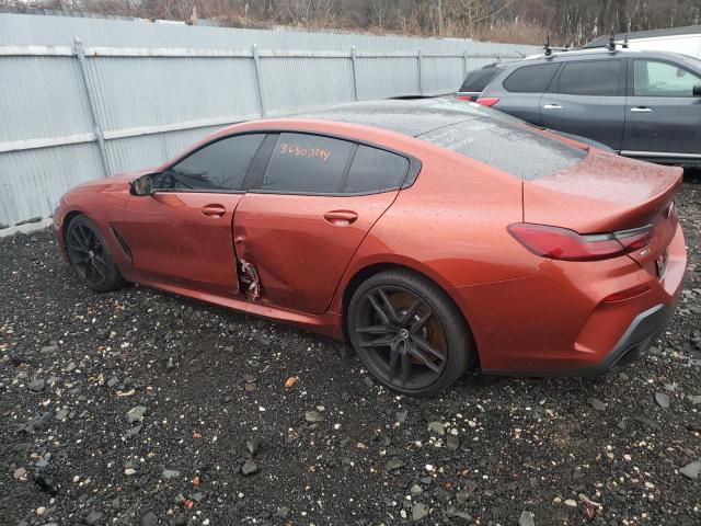 WBAGV8C08PCK86910 - 2023 BMW M850XI ORANGE photo 2