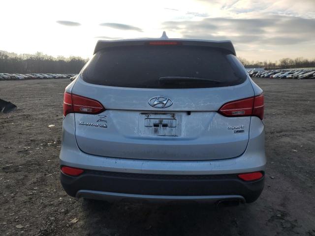 5XYZTDLB0GG310785 - 2016 HYUNDAI SANTA FE S SILVER photo 6