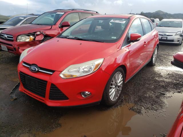 1FAHP3M20CL423374 - 2012 FORD FOCUS SEL RED photo 1