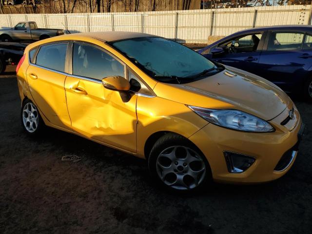 3FADP4FJ4BM124296 - 2011 FORD FIESTA SES YELLOW photo 4