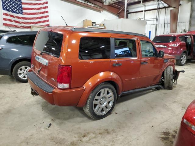 1D8GU58K57W678936 - 2007 DODGE NITRO SLT ORANGE photo 3