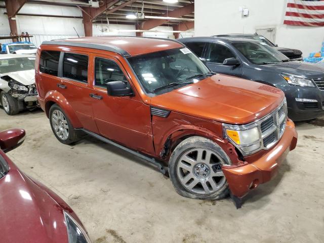 1D8GU58K57W678936 - 2007 DODGE NITRO SLT ORANGE photo 4