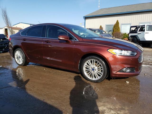 3FA6P0HD2GR313967 - 2016 FORD FUSION SE BURGUNDY photo 4