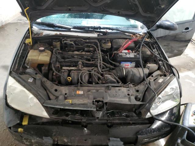 1FAFP34N85W193618 - 2005 FORD FOCUS ZX4 BLACK photo 11