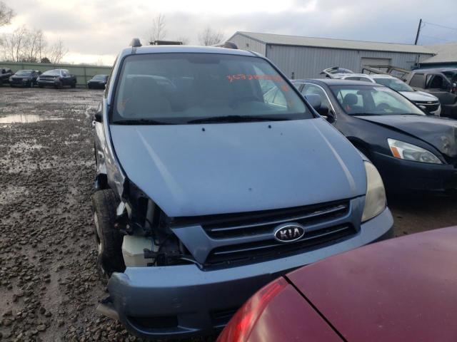 KNDMB233566031408 - 2006 KIA SEDONA EX BLUE photo 5