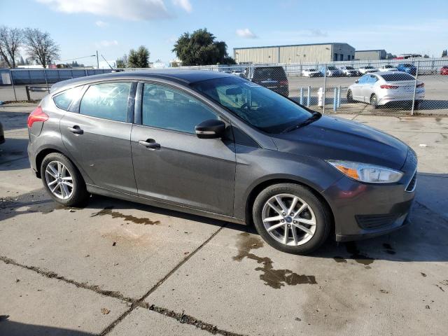 1FADP3K23HL344404 - 2017 FORD FOCUS SE CHARCOAL photo 4