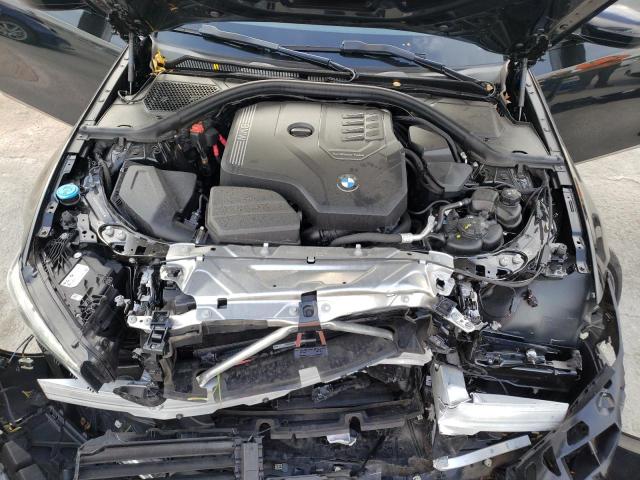 3MW69FF06P8D61014 - 2023 BMW 330I BLACK photo 11