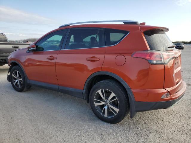 2T3WFREV8GW309349 - 2016 TOYOTA RAV4 XLE ORANGE photo 2