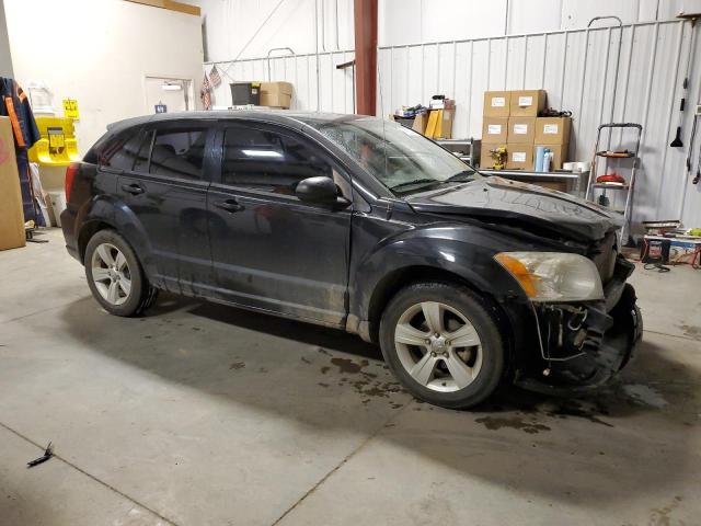 1B3CB3HA1AD581025 - 2010 DODGE CALIBER MAINSTREET BLACK photo 4