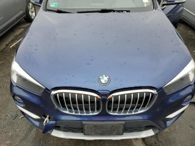 WBXHT3C36J3H31247 - 2018 BMW X1 XDRIVE28I BLUE photo 11