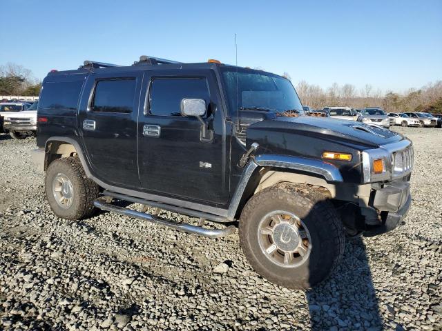 5GRGN23UX5H132619 - 2005 HUMMER H2 BLACK photo 4