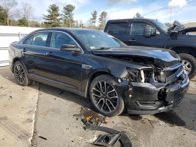 1FAHP2E81HG134825 - 2017 FORD TAURUS SEL BLACK photo 4