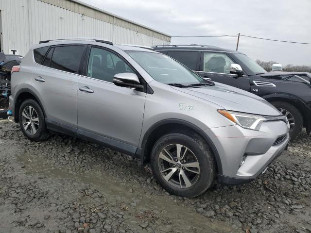 2T3RFREVXGW481945 - 2016 TOYOTA RAV4 XLE SILVER photo 4