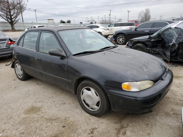 1Y1SK52872Z402191 - 2002 CHEVROLET GEO PRIZM BASE BLACK photo 4