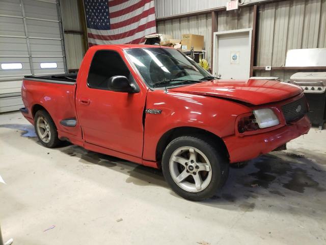 2FTZF0734XCB06122 - 1999 FORD F150 SVT LIGHTNING RED photo 4