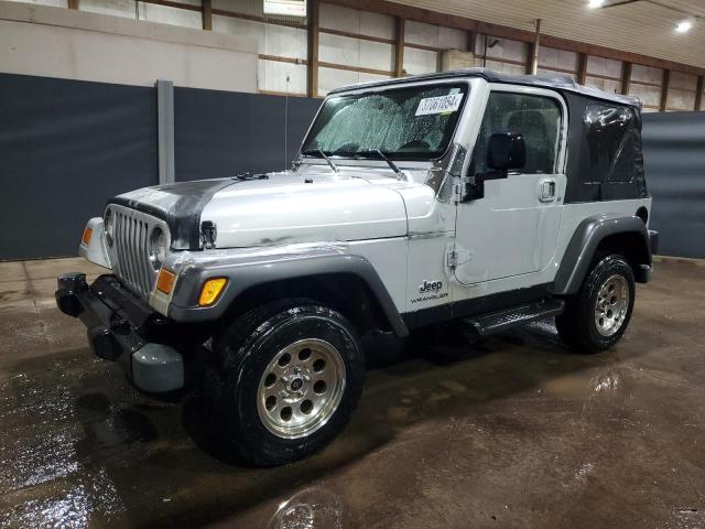 1J4FA39S24P797811 - 2004 JEEP WRANGLER X GRAY photo 1