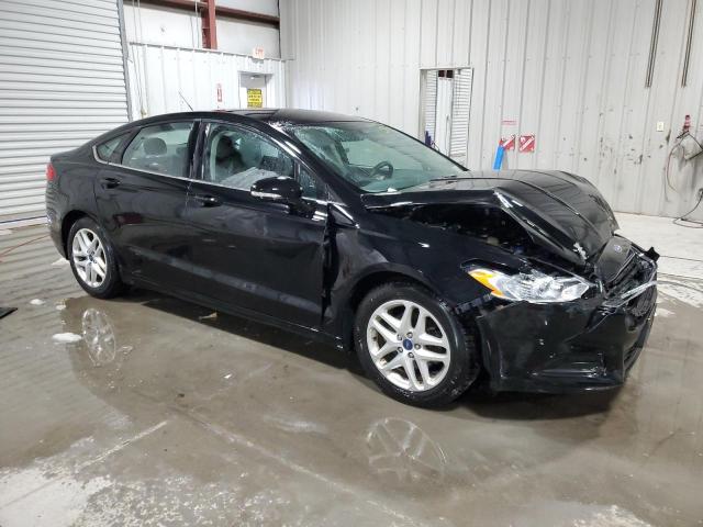 1FA6P0H77G5129461 - 2016 FORD FUSION SE BLACK photo 4