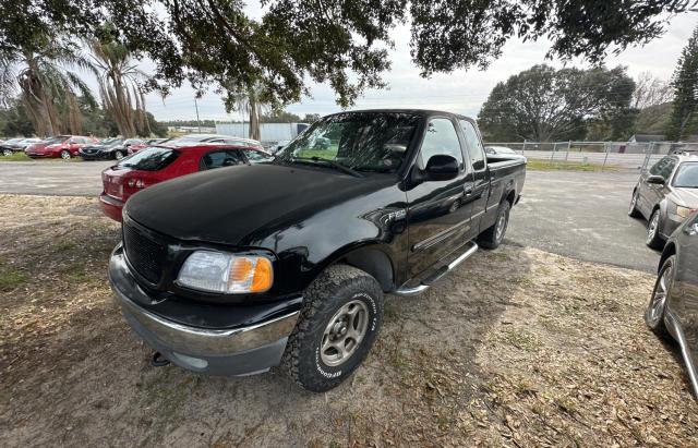 1FTEX17L4VND40155 - 1997 FORD F150 BLACK photo 2