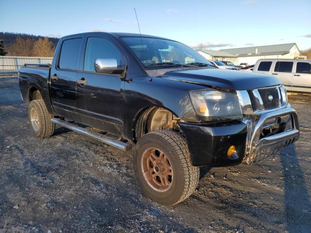 1N6BA0EC7AN303089 - 2010 NISSAN TITAN XE BLACK photo 4