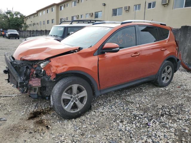 JTMWFREV6FD059332 - 2015 TOYOTA RAV4 XLE ORANGE photo 1