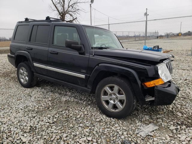 1J8HG48P67C672847 - 2007 JEEP COMMANDER BLACK photo 4