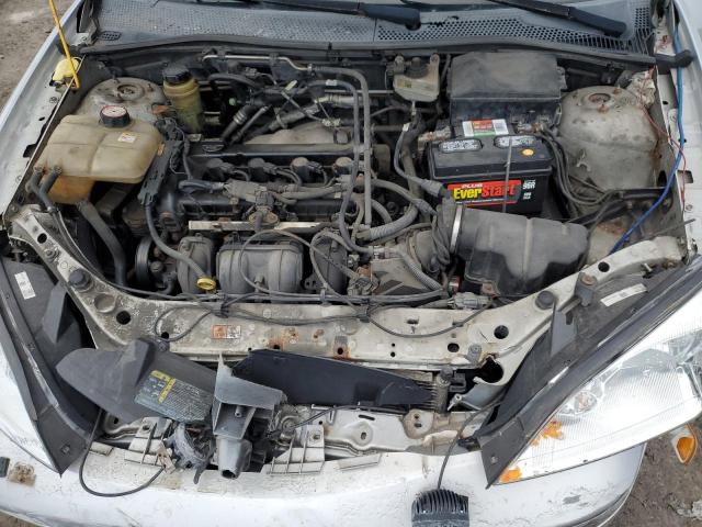 1FAFP34N35W158937 - 2005 FORD FOCUS ZX4 SILVER photo 11