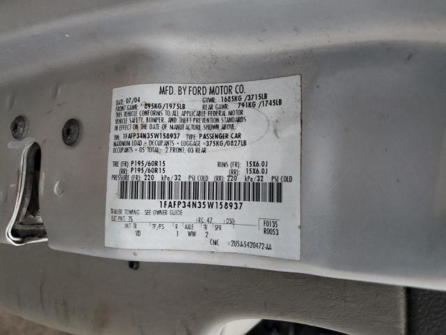 1FAFP34N35W158937 - 2005 FORD FOCUS ZX4 SILVER photo 12