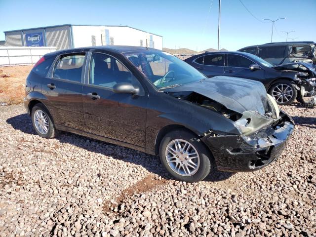 1FAFP37N06W165969 - 2006 FORD FOCUS ZX5 BLACK photo 4