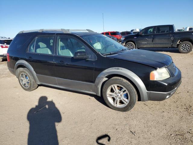 1FMZK02136GA51608 - 2006 FORD FREESTYLE SEL BLACK photo 4