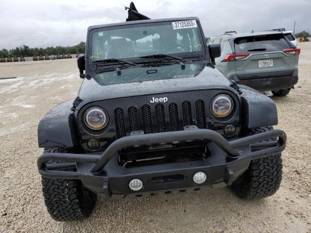 1J4AA5D10AL180060 - 2010 JEEP WRANGLER SAHARA BLACK photo 5