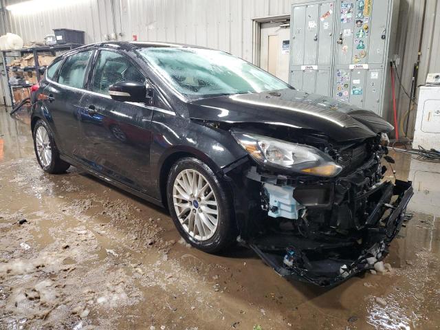 1FADP3N27EL279340 - 2014 FORD FOCUS TITANIUM BLACK photo 4