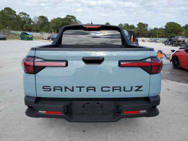 5NTJA4AE8NH010094 - 2022 HYUNDAI SANTA CRUZ SE BLUE photo 6