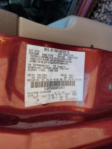 1FAFP34NX6W102611 - 2006 FORD FOCUS ZX4 BURGUNDY photo 12