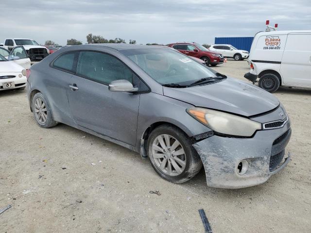 KNAFX6A88F5419140 - 2015 KIA FORTE EX BLUE photo 4