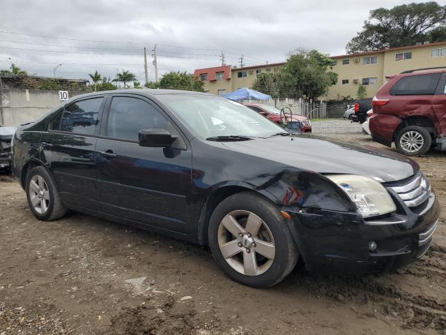 3FAHP07Z07R185251 - 2007 FORD FUSION SE BLACK photo 4