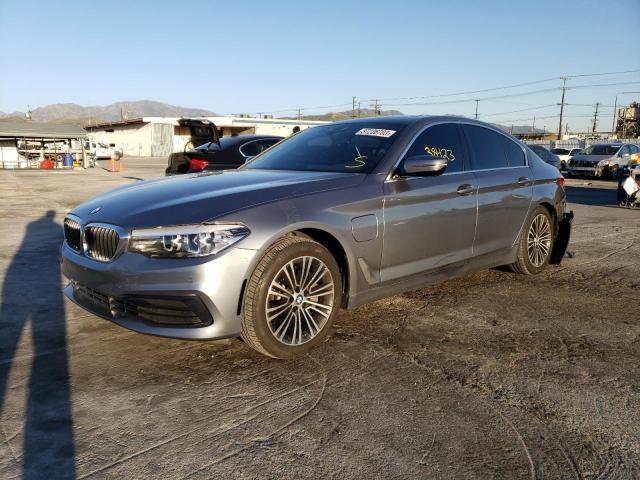 WBAJA9C51KB399096 - 2019 BMW 530E GRAY photo 1