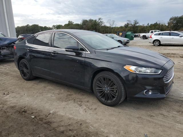 3FA6P0H96ER224606 - 2014 FORD FUSION SE BLACK photo 4