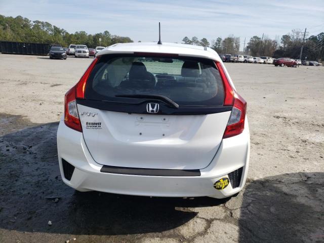 JHMGK5H56GS006890 - 2016 HONDA FIT LX WHITE photo 6