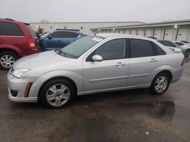 1FAFP38Z77W103696 - 2007 FORD FOCUS ST SILVER photo 1