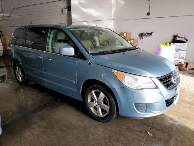 2V8HW34199R595041 - 2009 VOLKSWAGEN ROUTAN SE BLUE photo 4