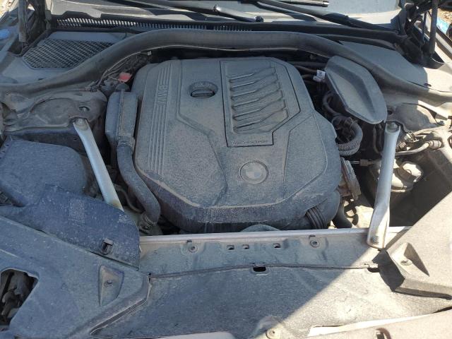 WBAAE2C02LCE41189 - 2020 BMW 840I BLUE photo 11