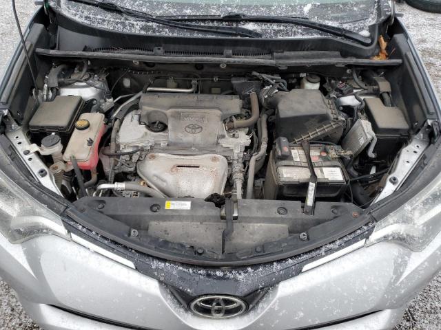 2T3ZFREV1HW320935 - 2017 TOYOTA RAV4 LE SILVER photo 12