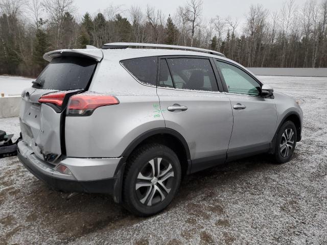 2T3ZFREV1HW320935 - 2017 TOYOTA RAV4 LE SILVER photo 3