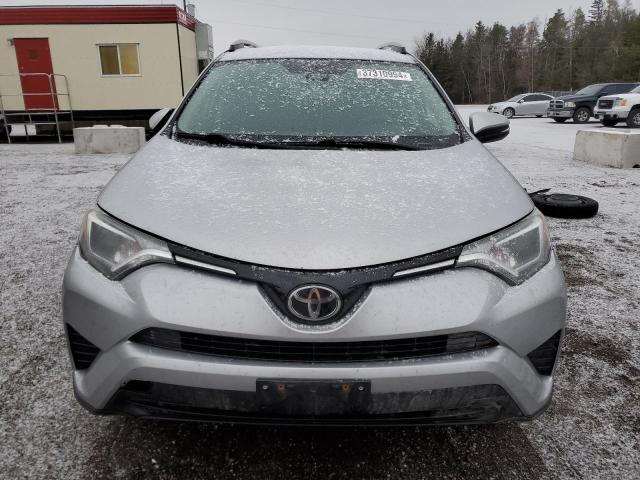 2T3ZFREV1HW320935 - 2017 TOYOTA RAV4 LE SILVER photo 5