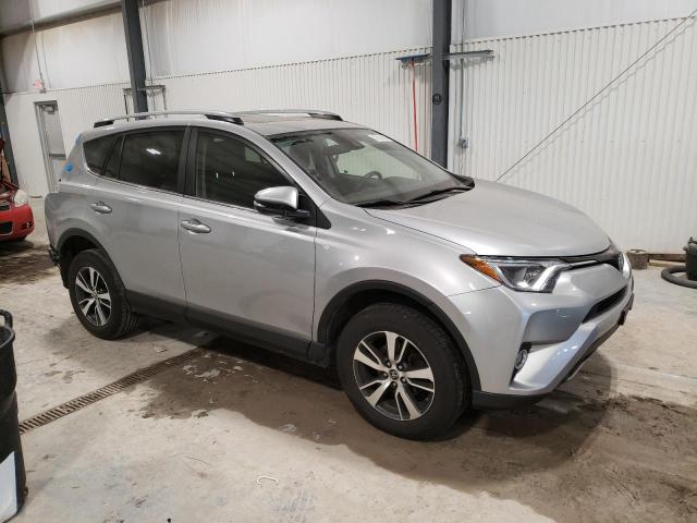 JTMRFREV7JJ212047 - 2018 TOYOTA RAV4 ADVENTURE SILVER photo 4