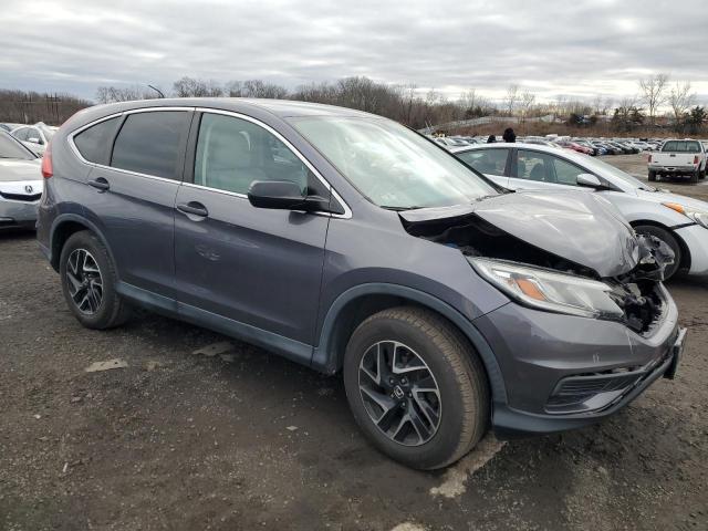 2HKRM4H49GH696977 - 2016 HONDA CR-V SE GRAY photo 4