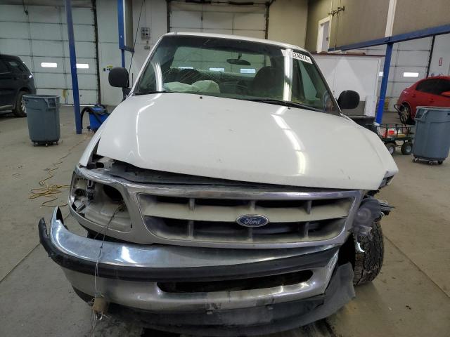 1FTZX1723WNB05482 - 1998 FORD F150 WHITE photo 11