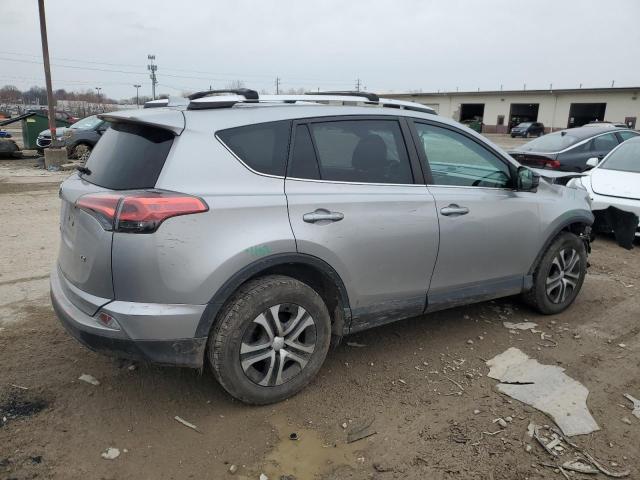 2T3ZFREV1GW242378 - 2016 TOYOTA RAV4 LE SILVER photo 3