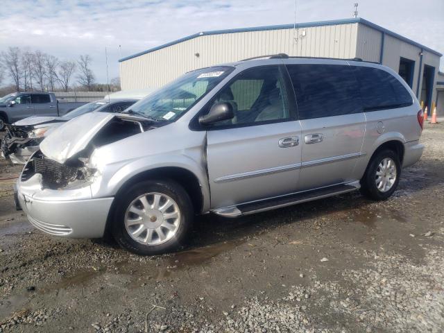 2C8GP74L01R290771 - 2001 CHRYSLER TOWN & COU EX SILVER photo 1